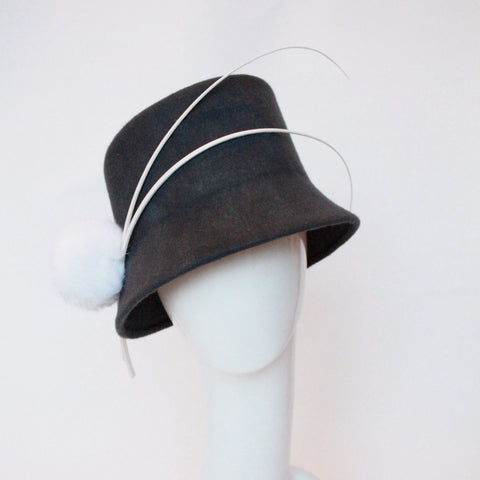 Grey cloche with ivory quills