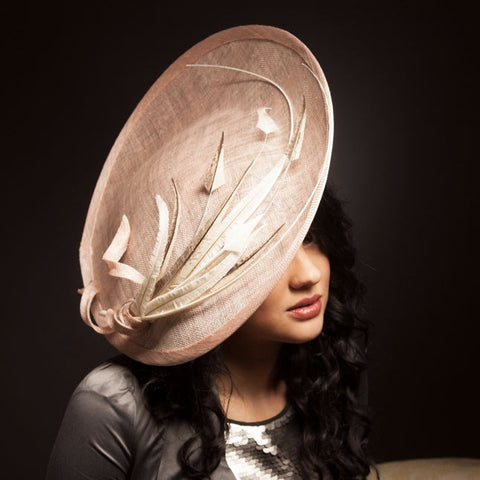 Dusty pink large hat with feathers, mother of the bride bristol. Royal Ascot
